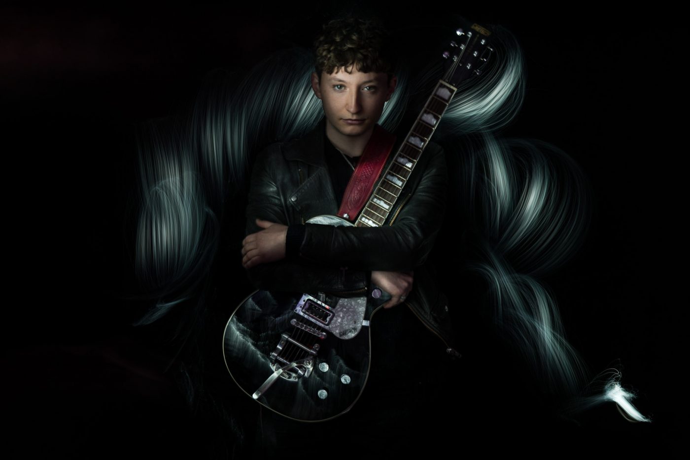 Jack-Valero-Brighton Musician Music Photographer Emma Bailey Photography. Light painting on black background.