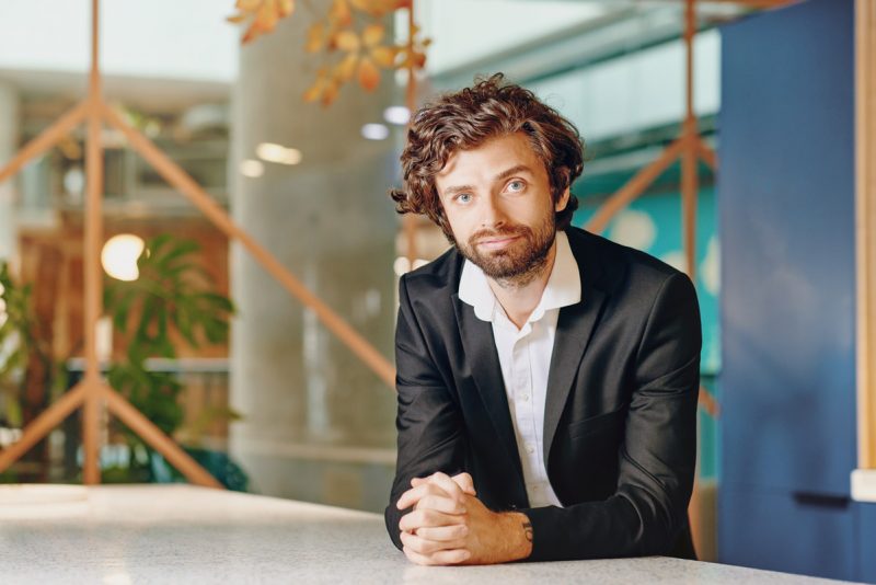 Louis-Stedman-Bryce-corporate headshot photography by brighton photographer emma bailey at hove beach huts