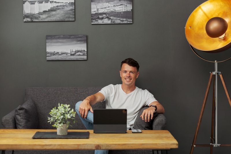 Louis-Stedman-Bryce-corporate headshot photography by brighton photographer emma bailey at hove beach huts