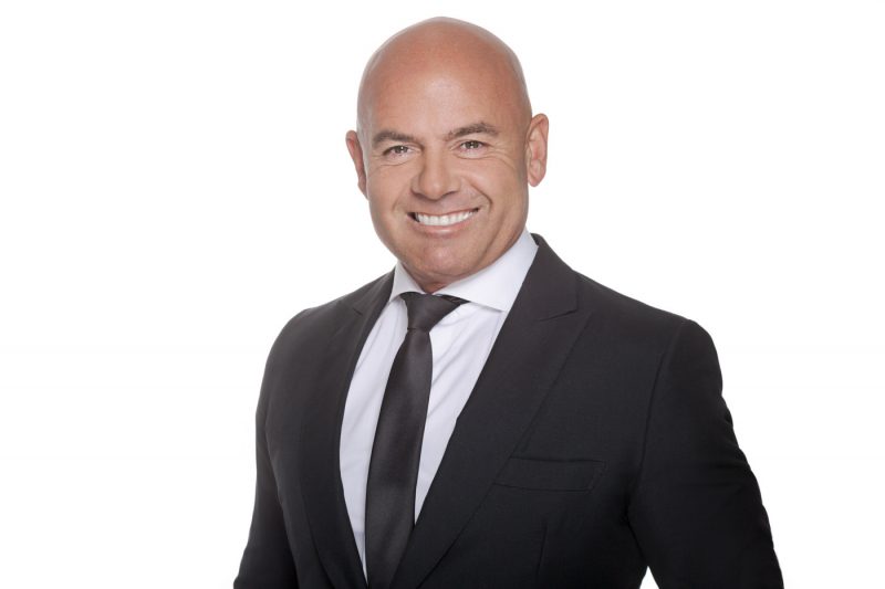 Louis-Stedman-Bryce-corporate headshot photography by brighton photographer emma bailey at hove beach huts